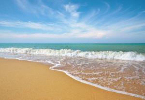 Sea and sand on the beach to represent coping with chronic illness